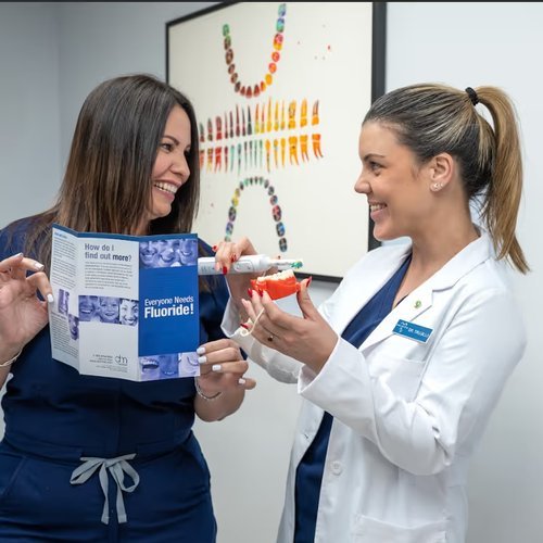 Dentist with a patient during a general dentistry visit